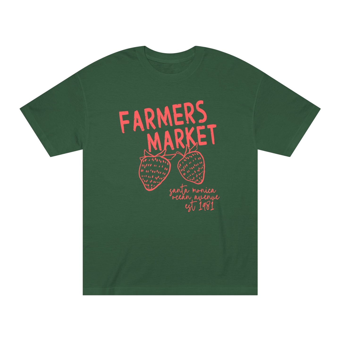 Blush pink Farmers Market graphic t-shirt featuring coral lettering and strawberry illustration inspired by Santa Monica Ocean Avenue.